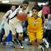 Pioneer senior Duane Simpson-Redmond steals the ball from Ypsilanti junior Janeau Joubert on Monday, March 4. Daniel Brenner I AnnArbor.com